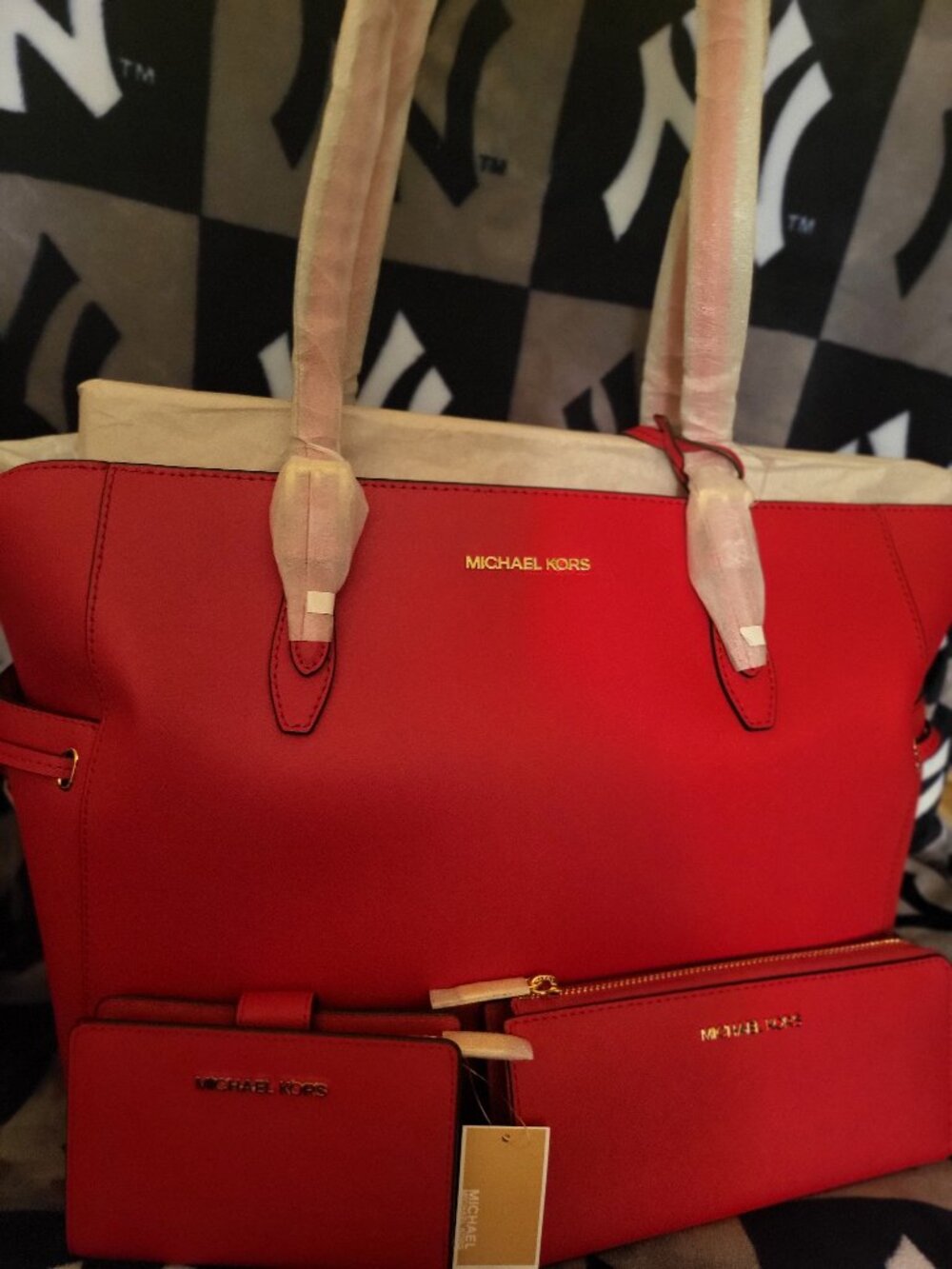 Red Michael Kors Handbag and wallets